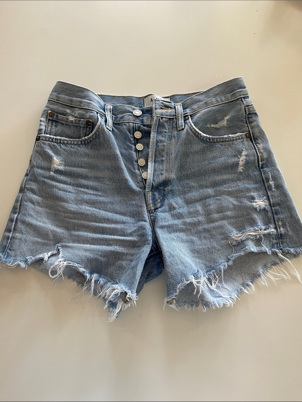 Agolde Light Blue Distressed Button-Fly Denim Shorts